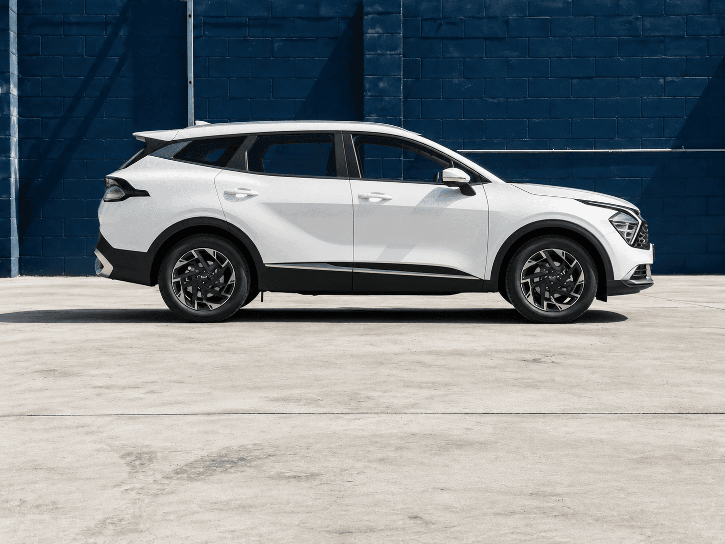 2023 Kia Sportage in White, side profile