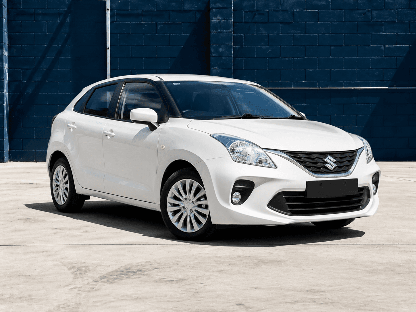 2022 Suzuki Baleno GL in White, front three-quarter view