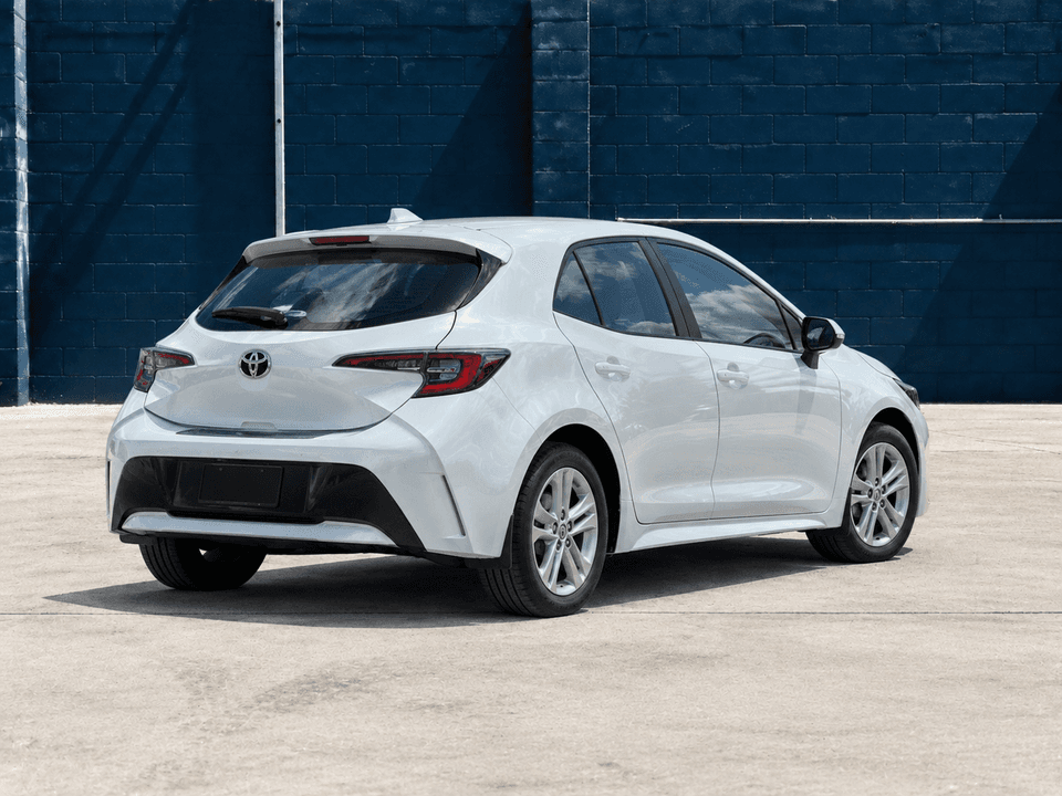 2022 Toyota Corolla Ascent Sport in White, rear three-quarter view